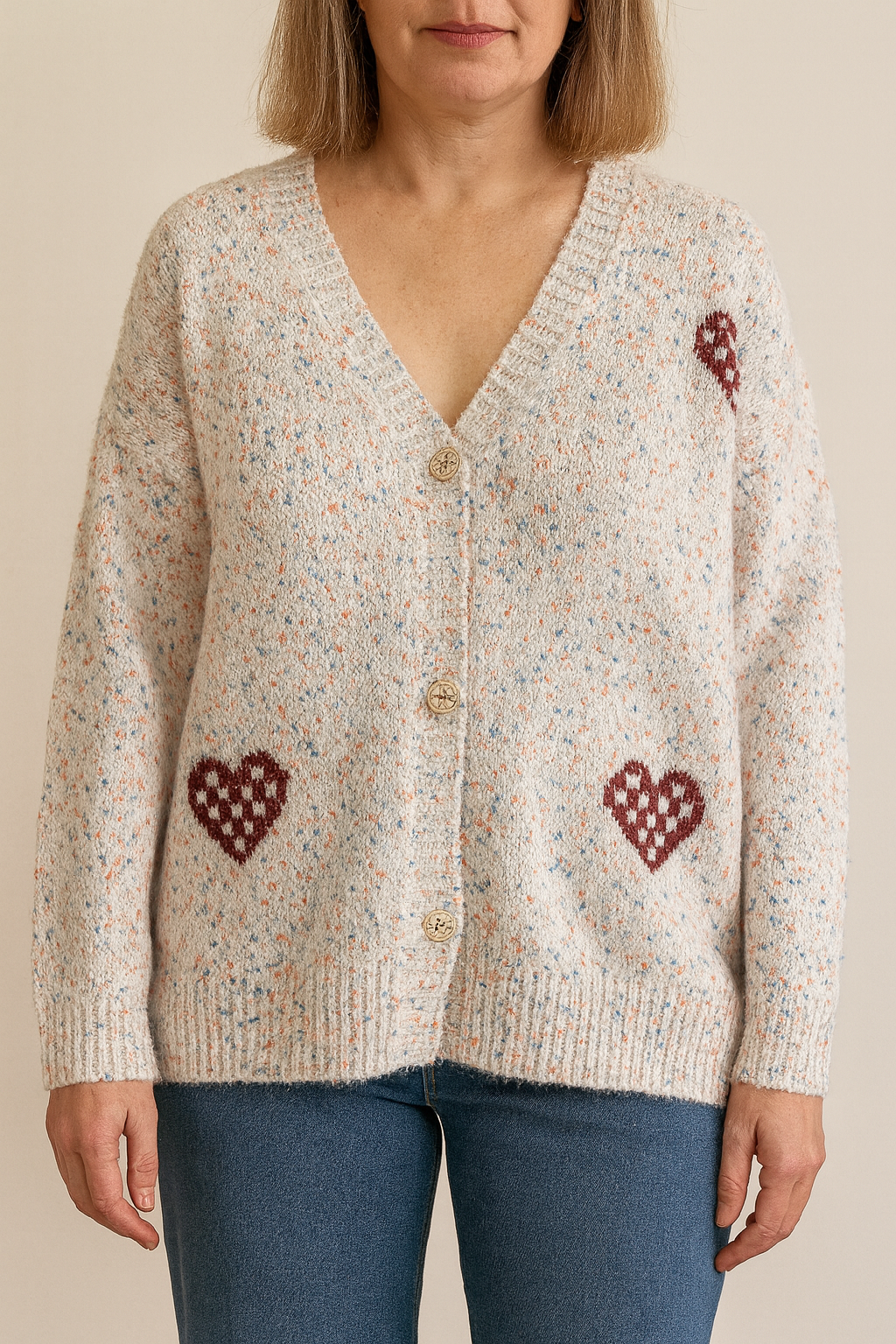 Gebreid vest met hartjes – creme